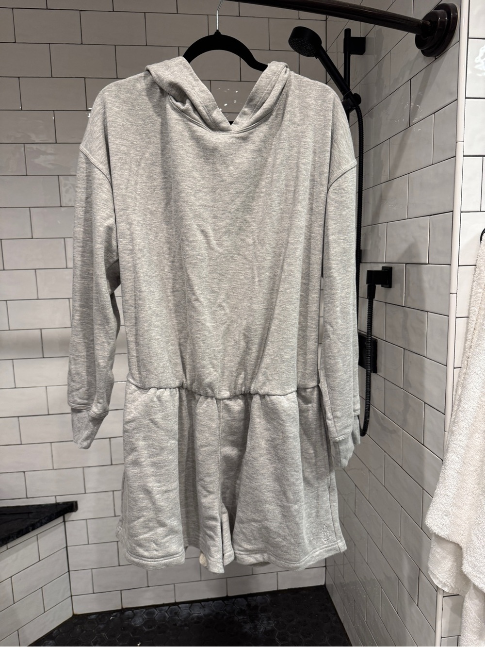 Free People hooded open back romper.